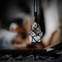 Natural clear quartz pendants with hand-wrapped cord for energy healing and mindfulness practices